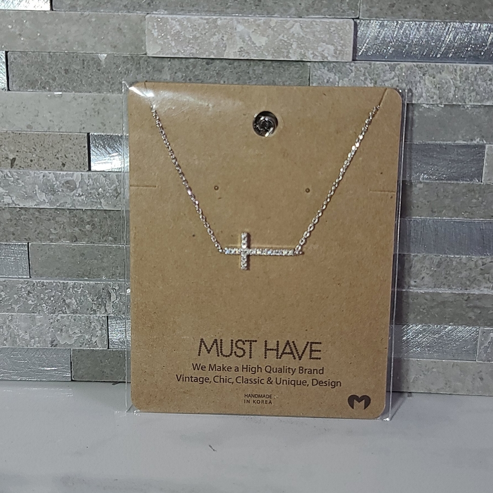 Silver tone cross necklace